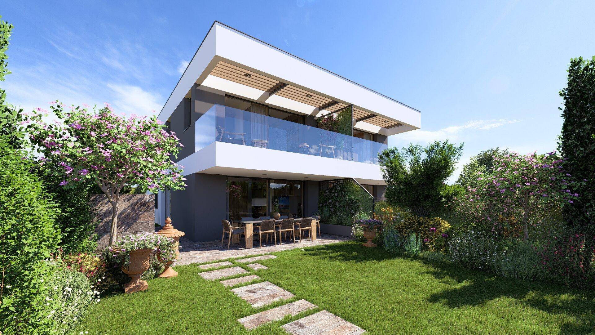 Moderne Architektur des Hauses mit Balkon, Terrasse und gepflegtem Gartenbereich.