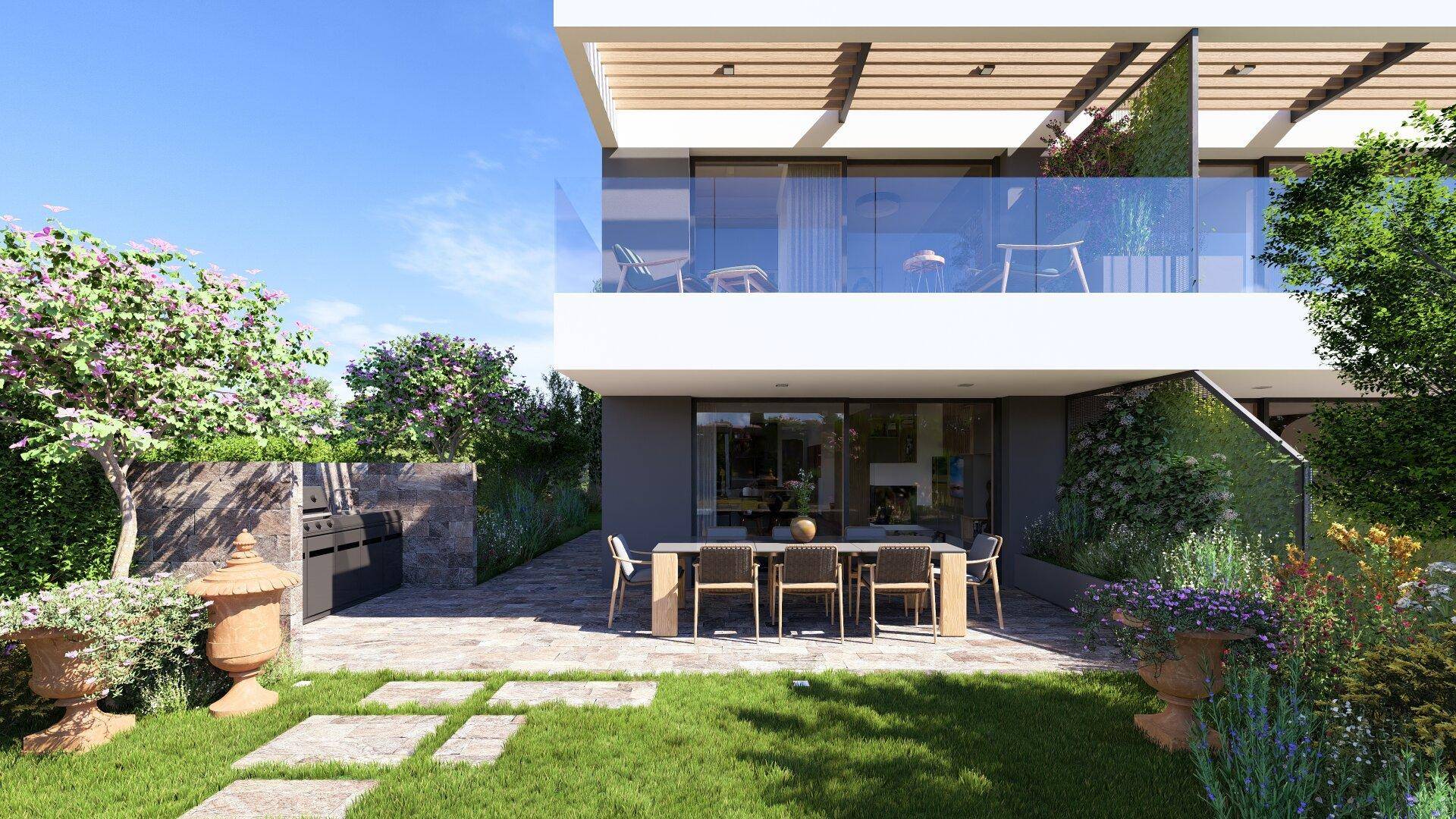 Moderne Terrasse mit Esstisch und Grillbereich, umgeben von einem gepflegten Garten.