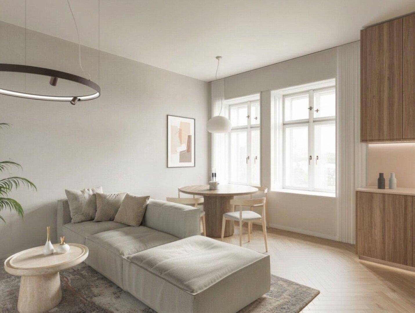 Gemütliches Wohnzimmer mit hellem Sofa, kleinem Esstisch und Holzelementen.