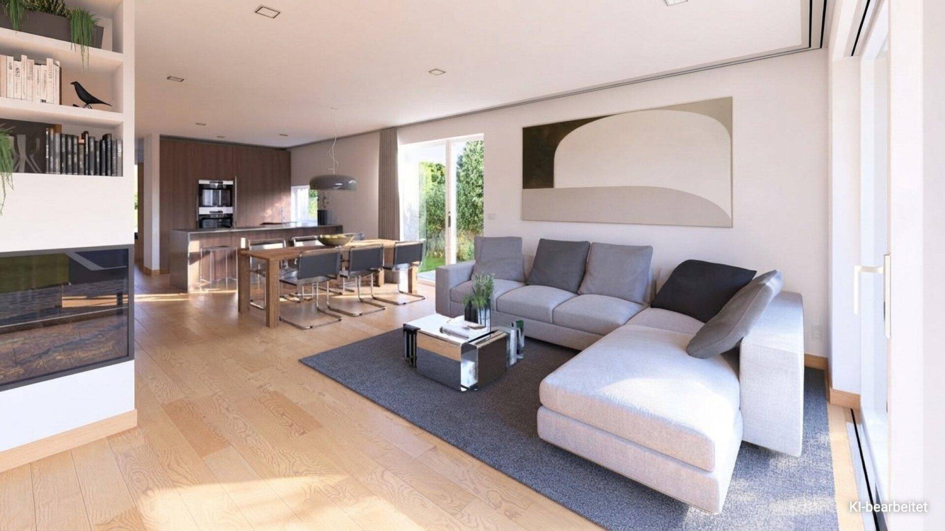 Offener Wohnbereich mit bequemer Couch, Holzboden und integrierter moderner Küche.