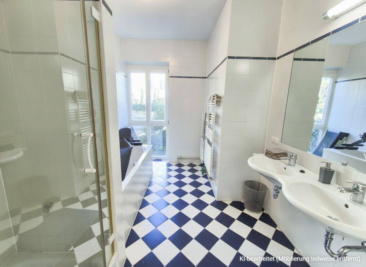 Geräumiges Badezimmer mit blau-weiß karierten Fliesen, Doppelwaschbecken und Duschkabine.