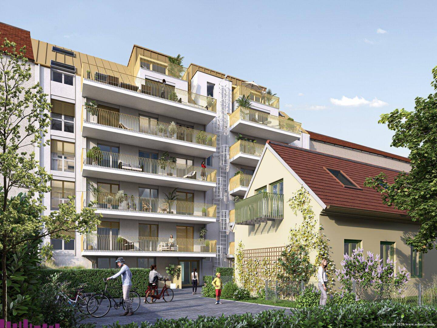 Rückansicht einer modernen Wohnanlage mit begrüntem Innenhof und Balkonen.