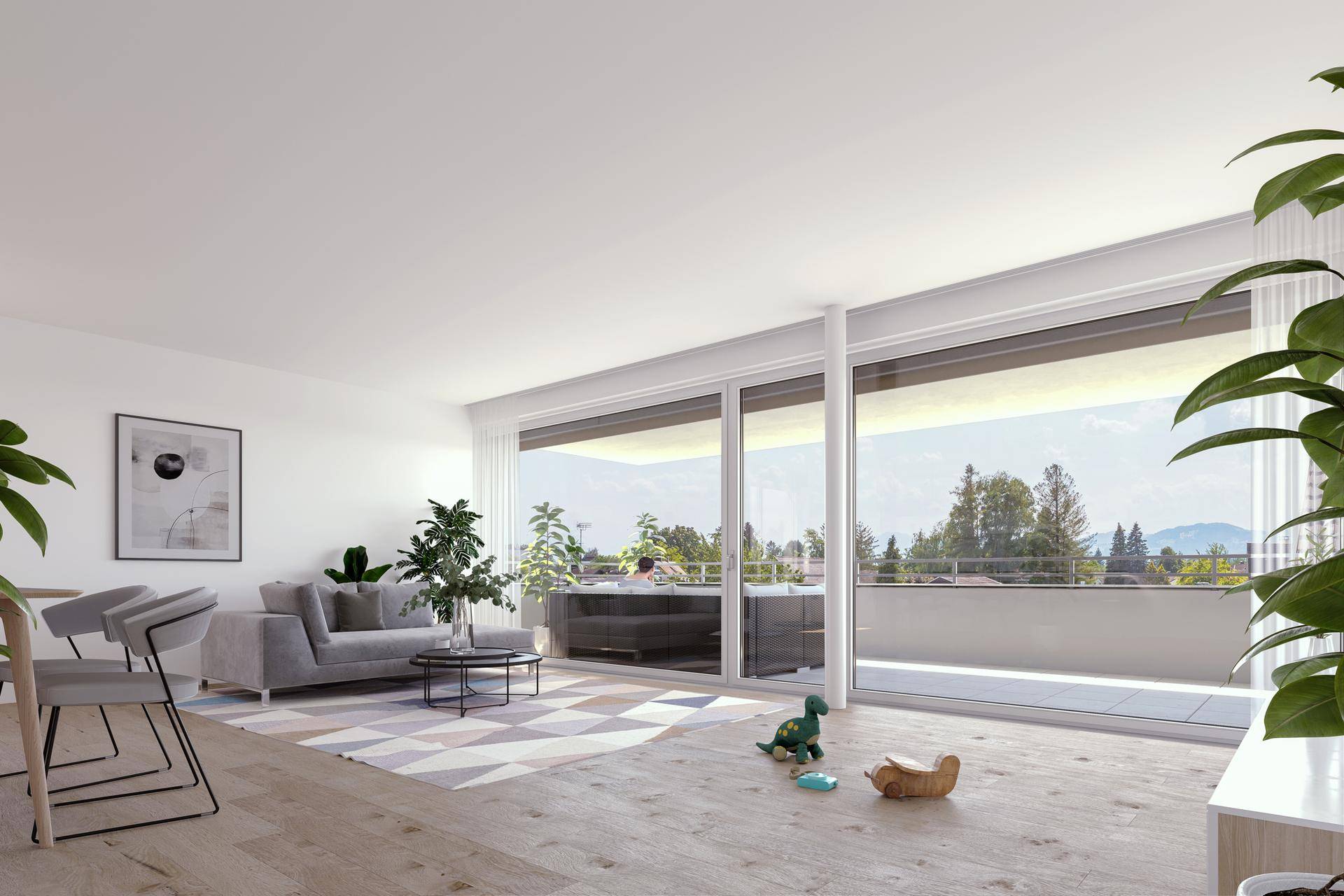 Geräumiges Wohnzimmer mit Holzboden, großen Fenstern und Blick ins Grüne.