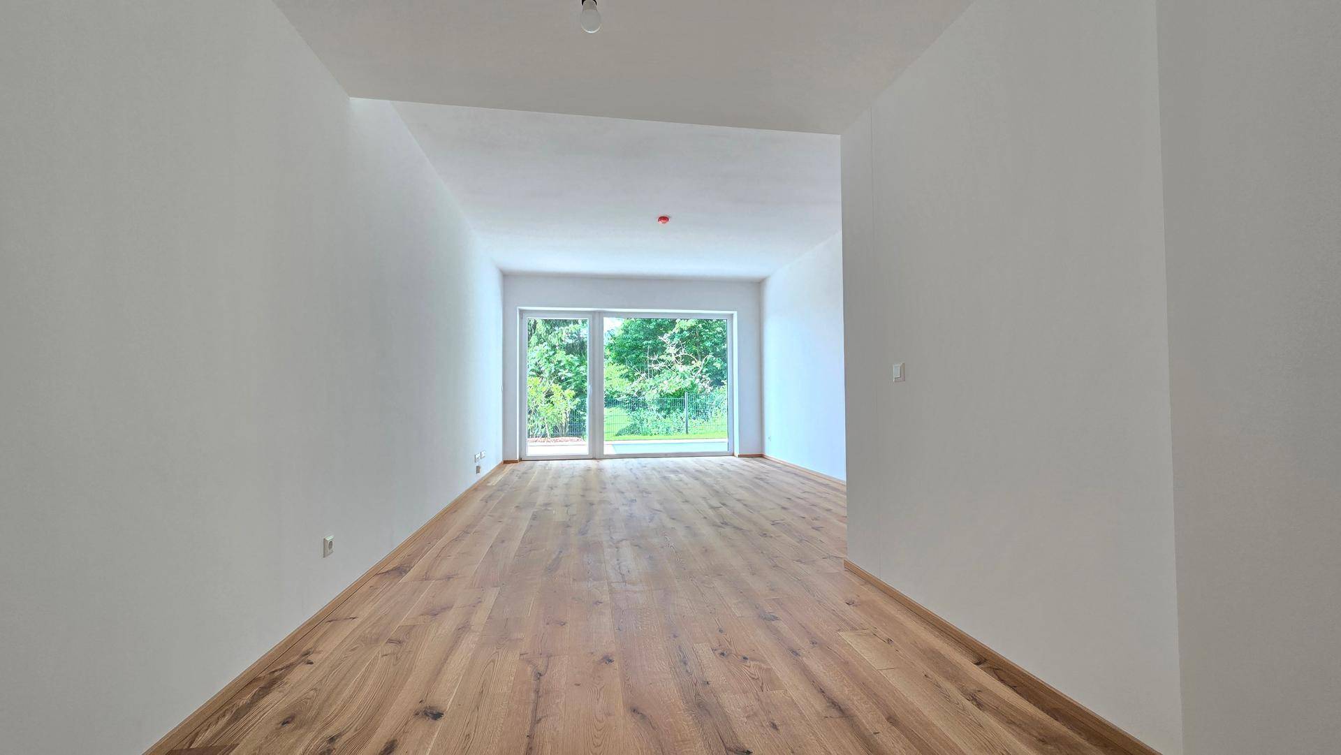 Erstbezug Erdgeschosswohnung mit Garten Top 4 - Ansicht 3