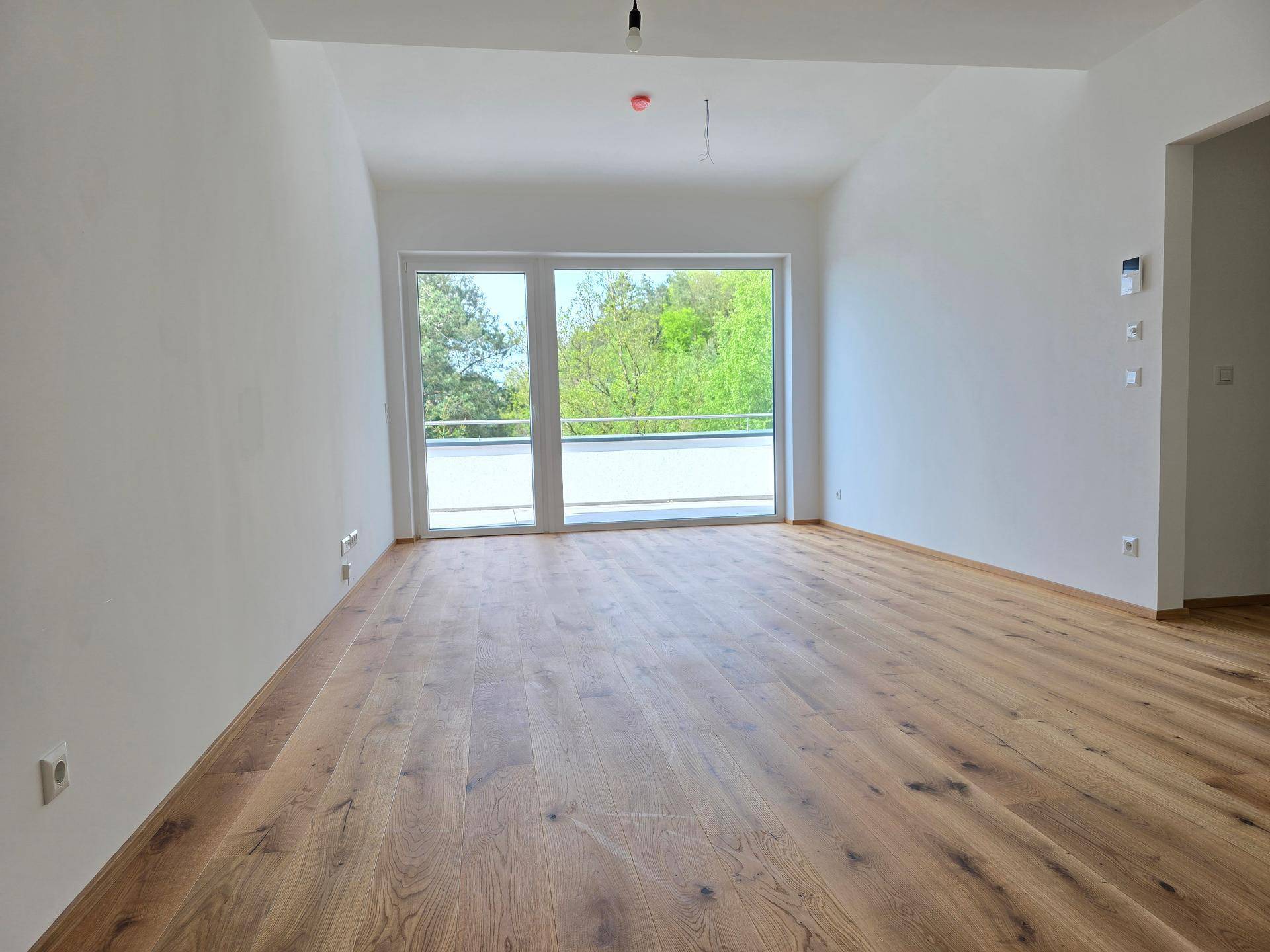 Bezugsfertige hochwertige Eigentumswohnung in bester Lage mit Balkon und freiem Blick ins Grüne - Ansicht 4
