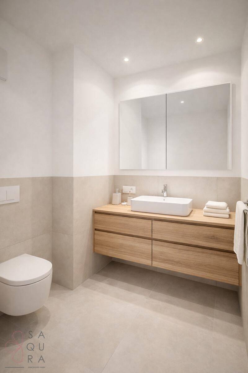 Modernes Badezimmer mit Holzwaschtisch, Aufsatzwaschbecken und wandhängendem WC, stilvoll gestaltet.