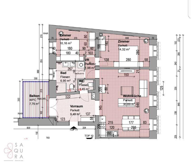 Grundriss einer Wohnung mit Wohnküche, zwei Zimmern, Bad und Balkon.