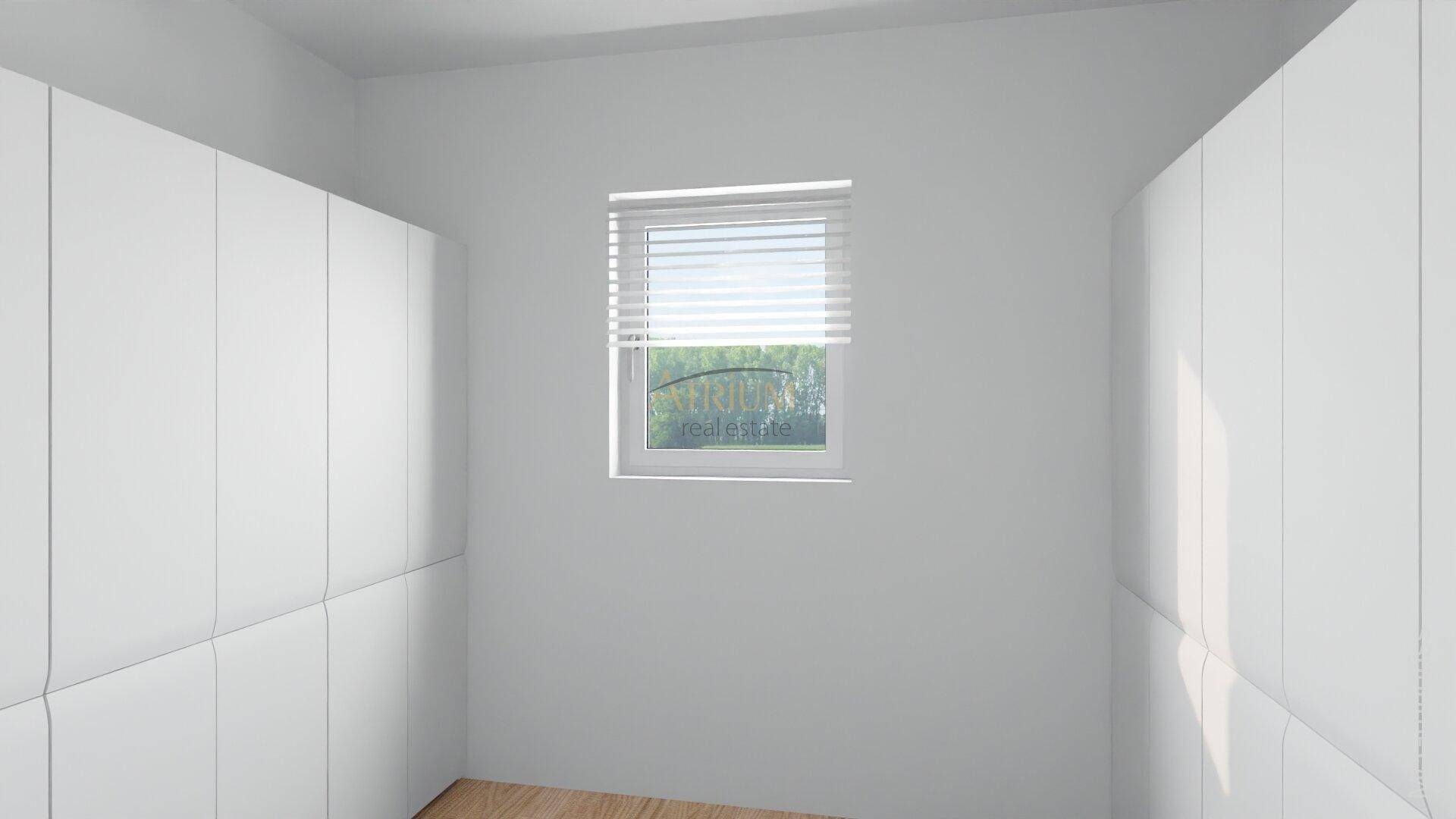 Kleiner Raum mit Einbauschränken und Fenster, ideal als Ankleidezimmer oder Abstellraum.