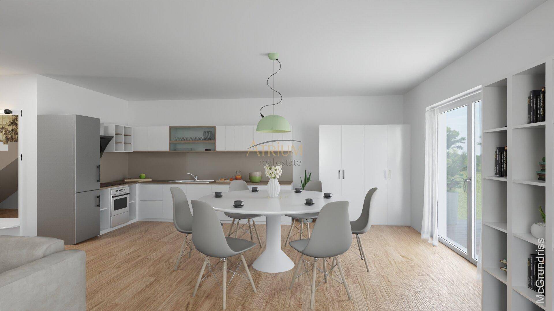 Moderne Wohnküche mit hellem Holzboden, weißer Einbauküche und Essbereich.