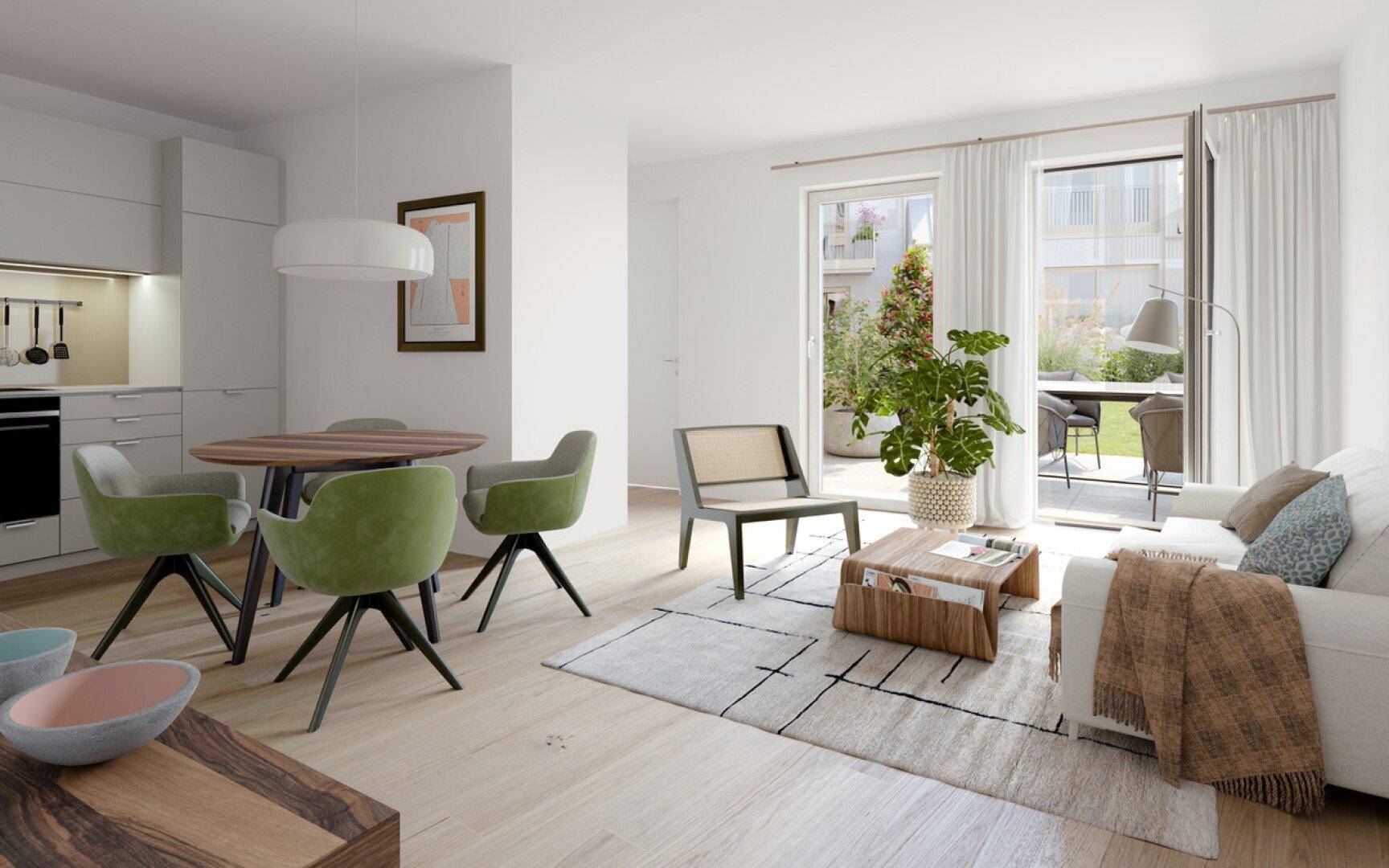 Heller, offener Wohn- und Essbereich mit moderner Küche und direktem Zugang zur Terrasse mit Grünblick.