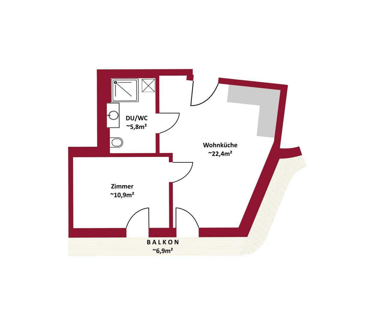 Grundriss einer Wohnung mit Wohnküche, Zimmer, Bad und Balkon.