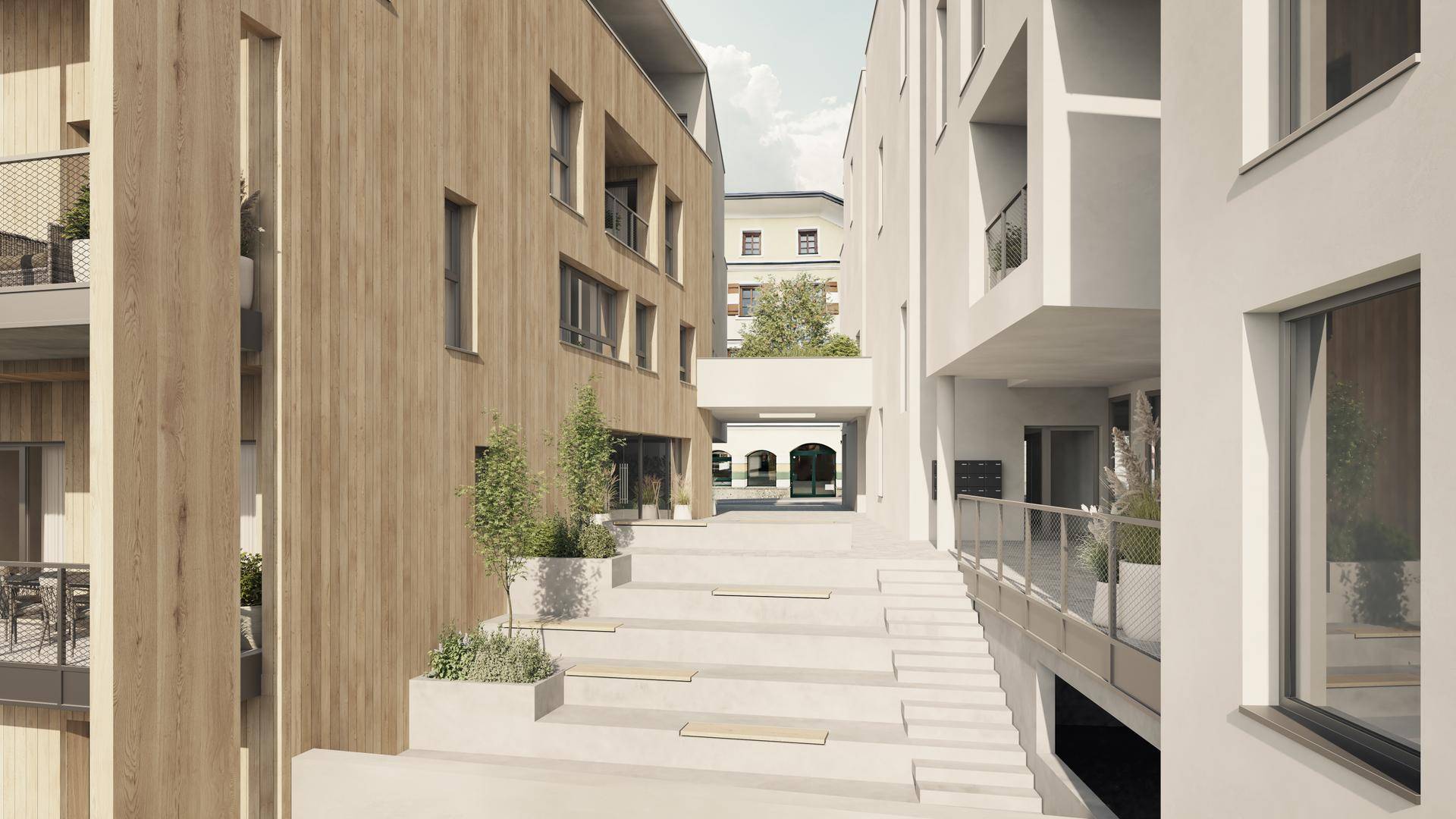 Moderne Architektur mit Holzfassaden und weiß verputzten Gebäuden, verbunden durch eine breite Treppenanlage.