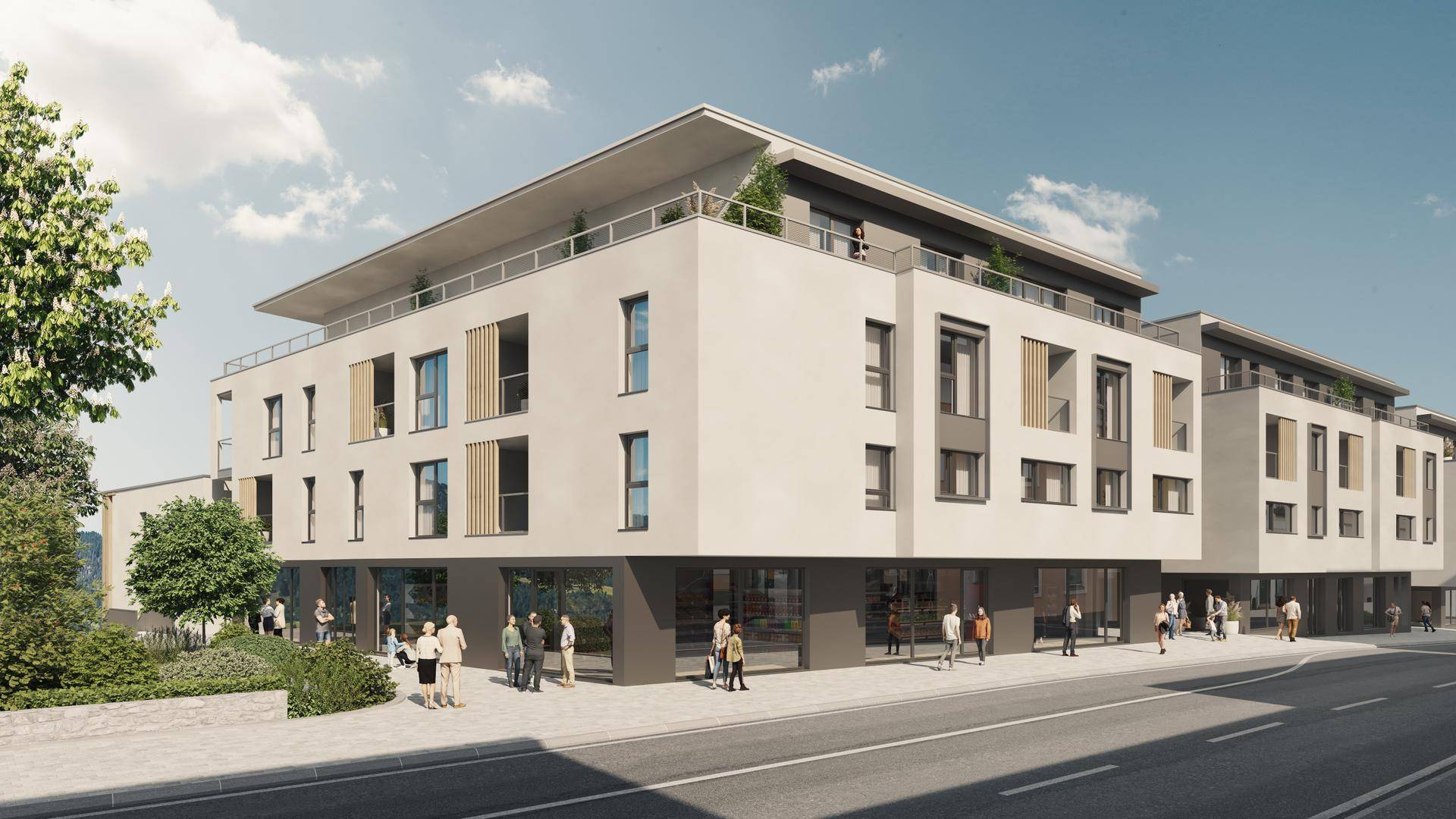 Modernes Mehrfamilienhaus mit Geschäften im Erdgeschoss und Balkonen, an einer Straße gelegen.