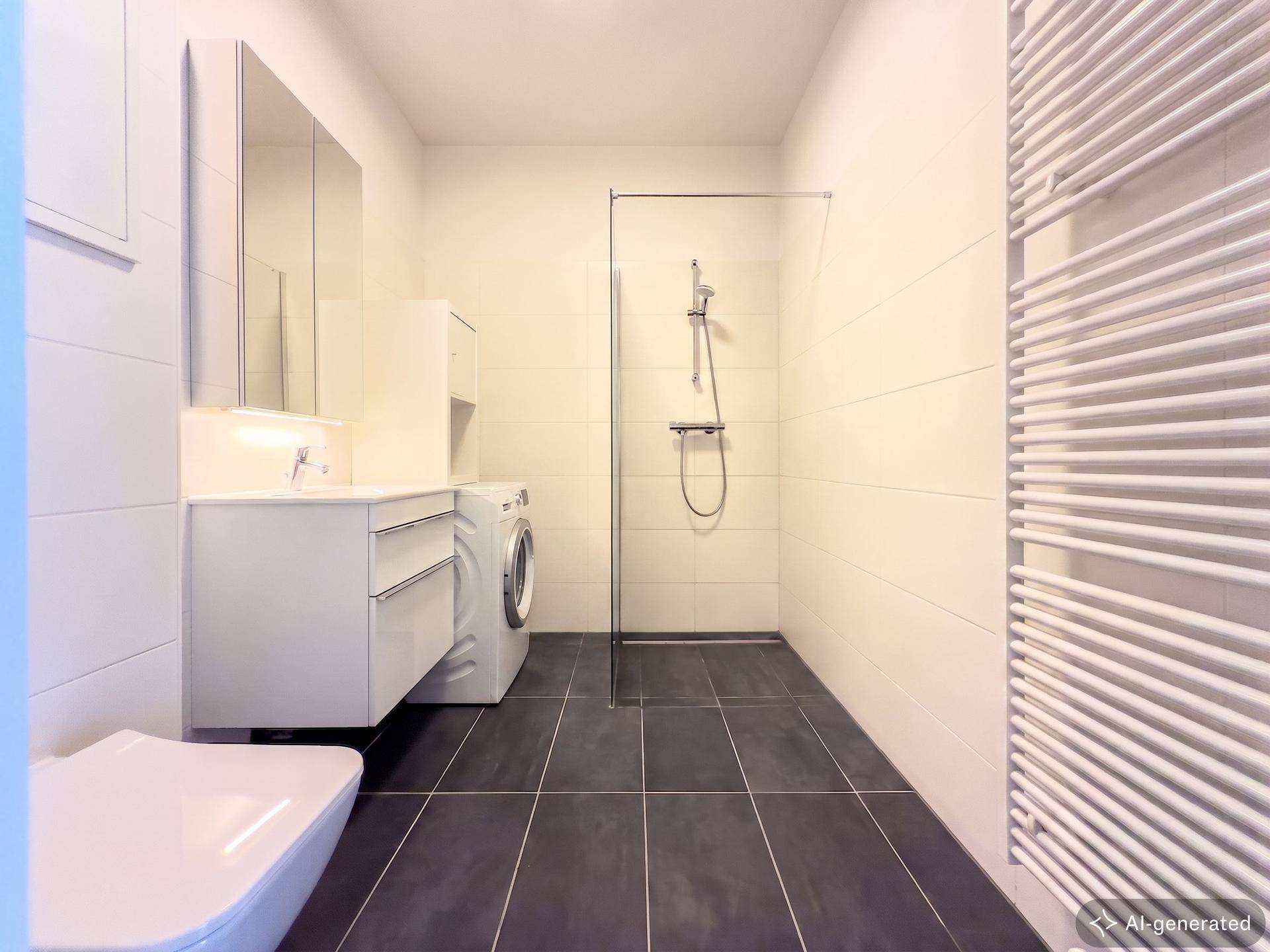 Modernes Badezimmer mit dunklen Fliesen, ebenerdiger Dusche, Waschmaschine und beheiztem Handtuchhalter.