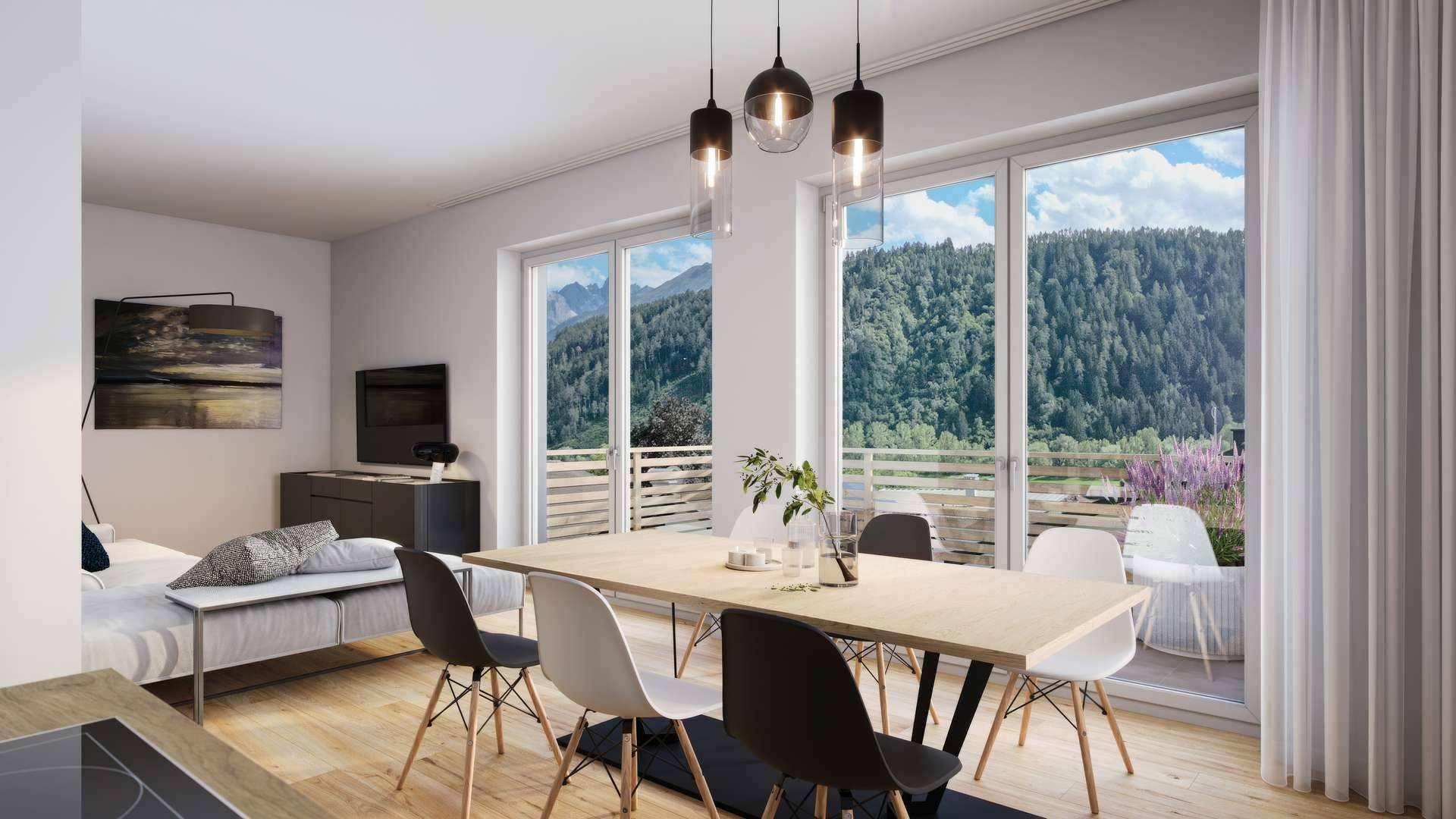 Lichtdurchfluteter Wohn-Essbereich mit Holzboden, Zugang zum Balkon und Bergblick.