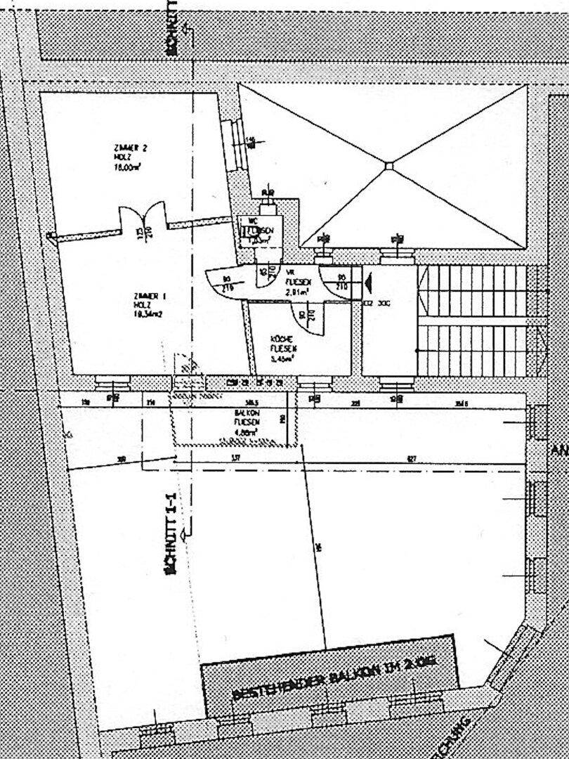 Grundriss des zweiten Obergeschosses mit zwei Zimmern, Küche und Balkon.