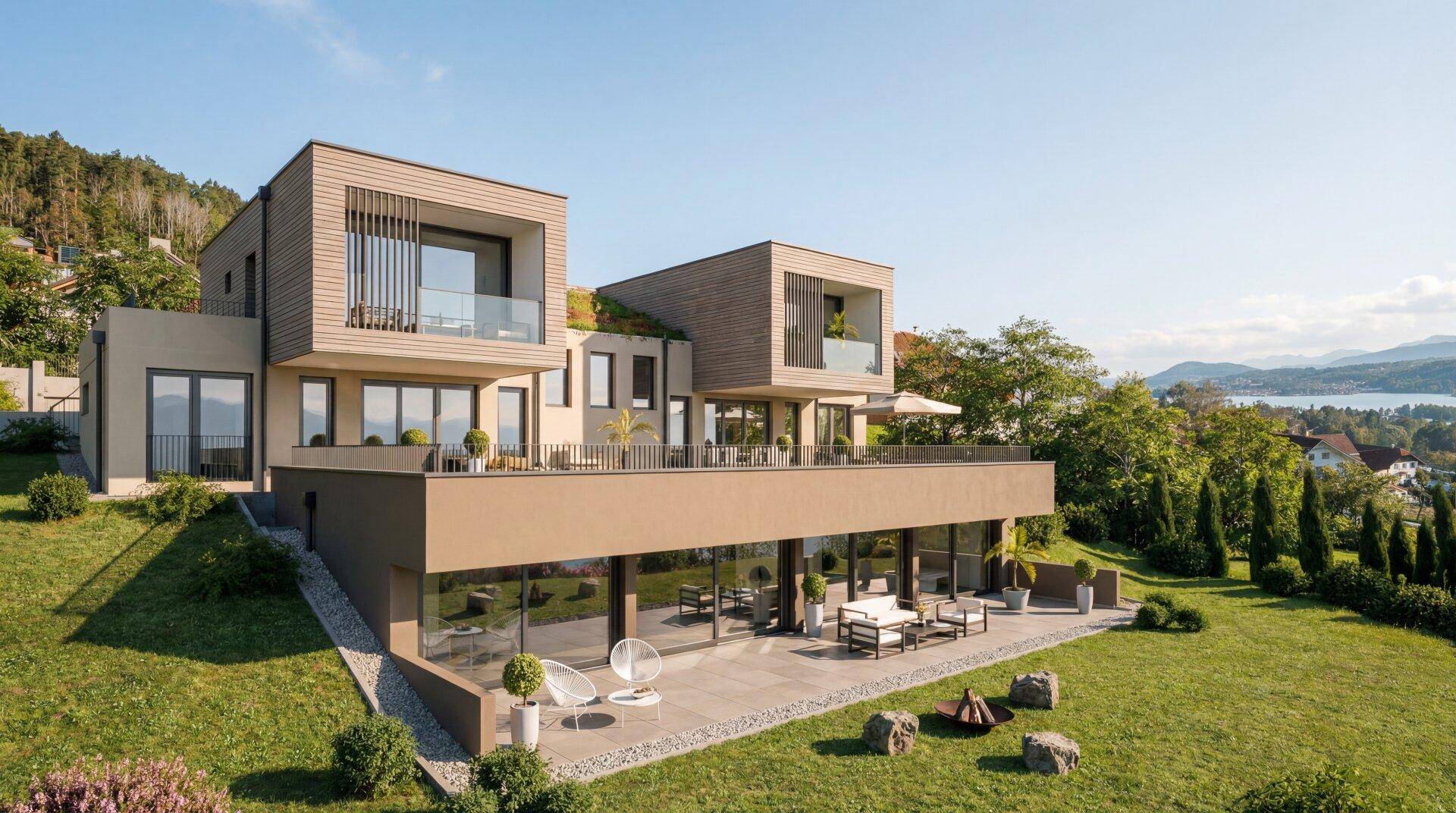 Exklusive Villa mit moderner Architektur, großzügigen Terrassen und weitem Blick auf den See und die Berge.