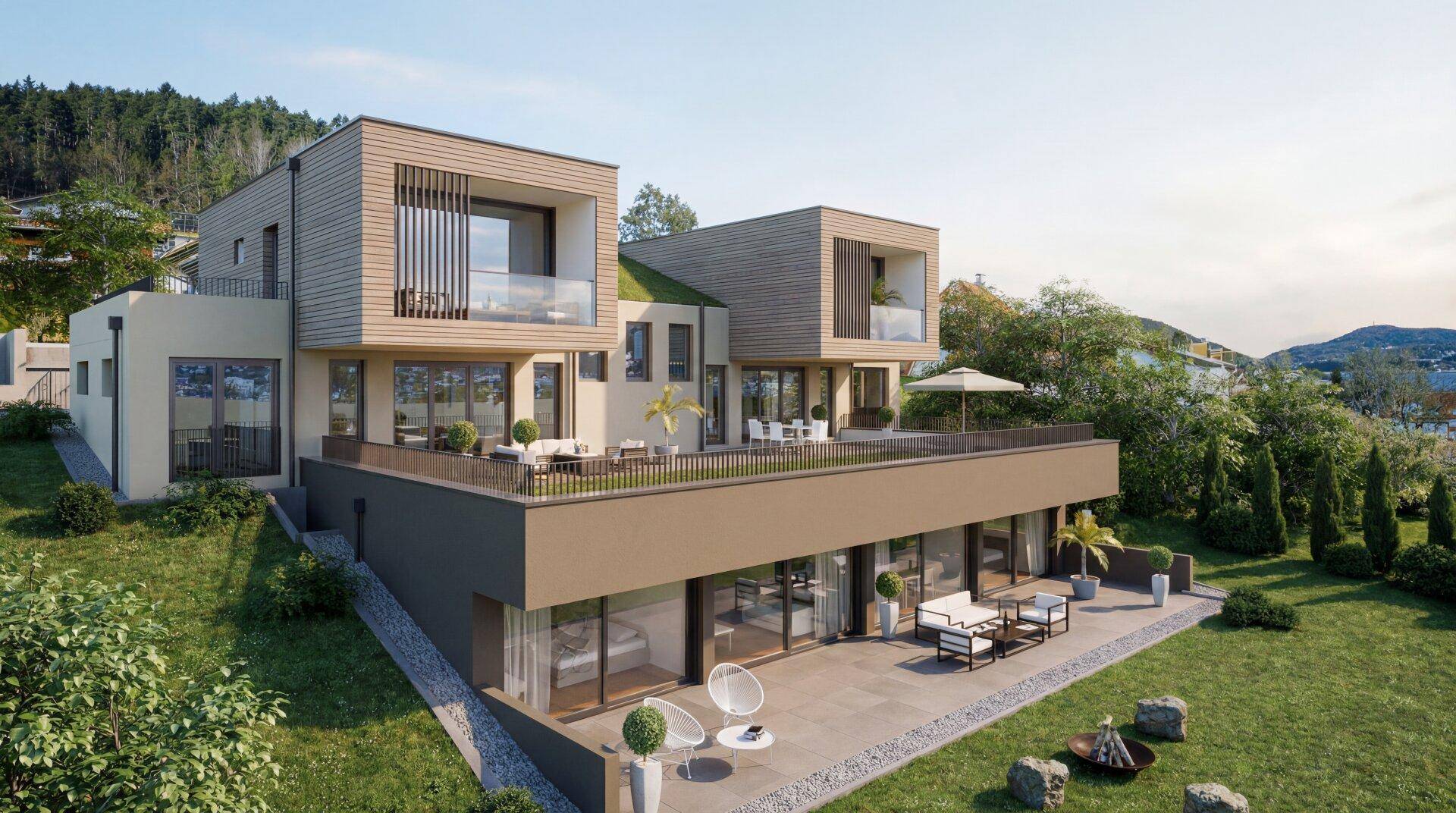 Zeitgenössische Villa mit mehreren Terrassen und großen Fensterfronten, harmonisch in die Natur integriert.