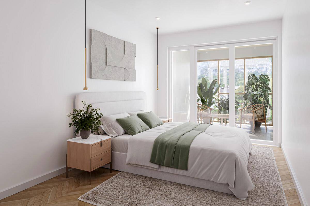 Helles Schlafzimmer mit modernem Bett, Holzboden und Zugang zu einem möblierten Balkon.