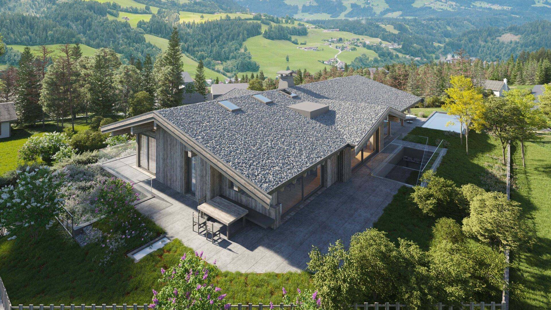 Architektonisch anspruchsvolles Gebäude mit Flachdach und weitem Blick über die hügelige Landschaft.