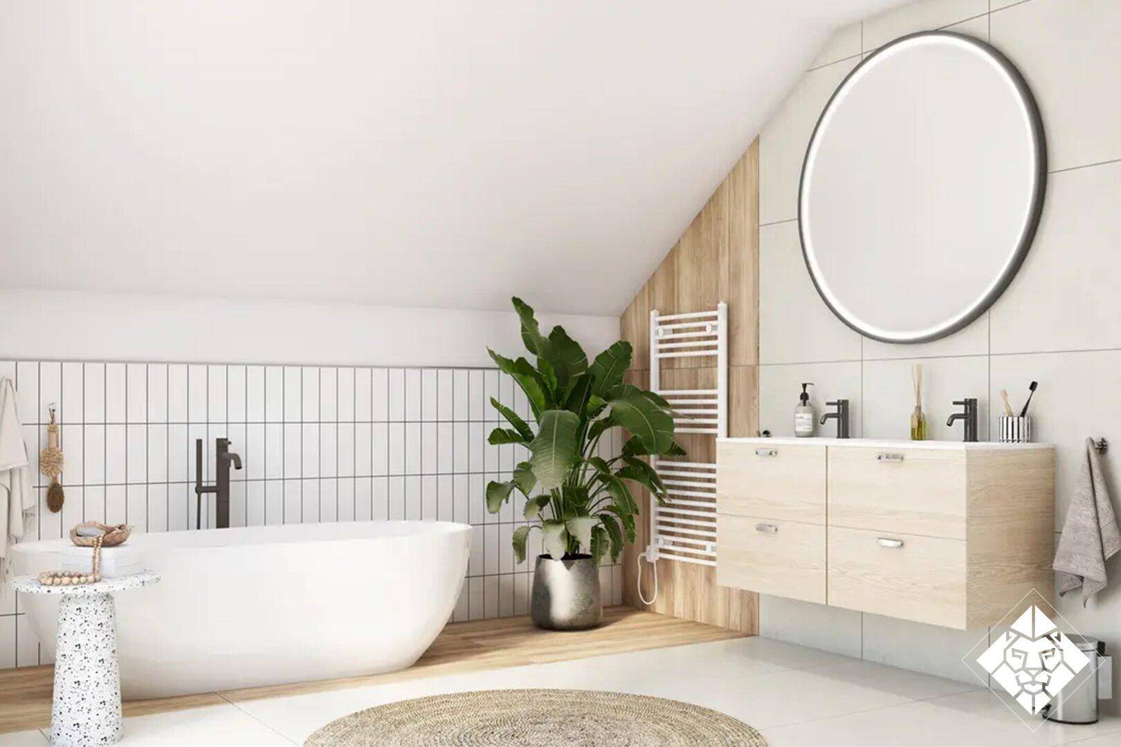Helles Badezimmer mit freistehender Badewanne, Doppelwaschbecken und Dachschräge.