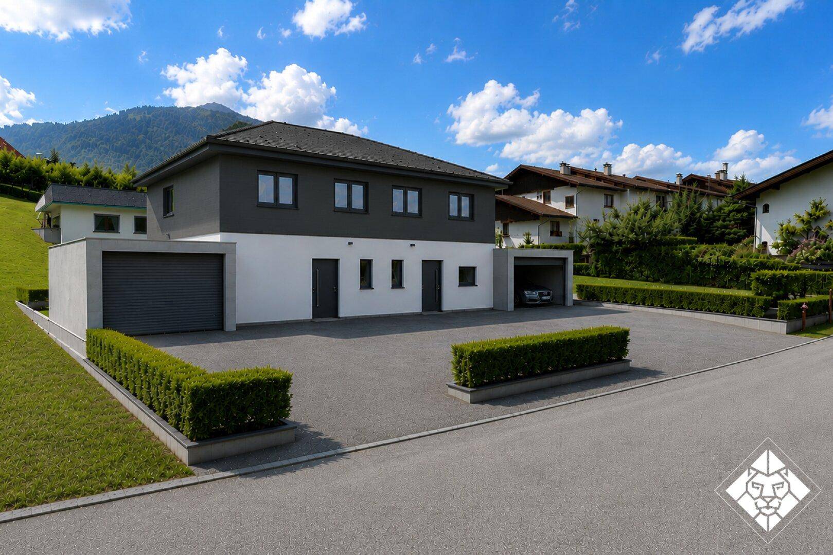 Zeitgenössische Doppelhaushälfte mit grauer Fassade, Garagen und gepflegter Außenanlage.