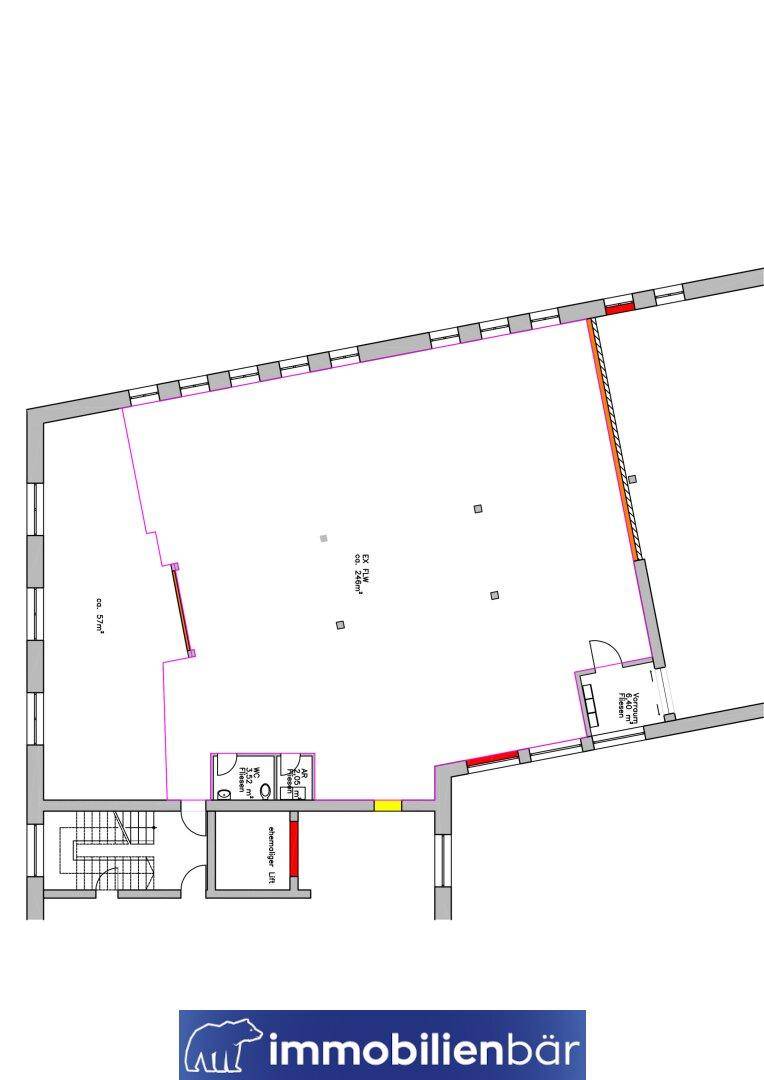 Grundriss zeigt eine große offene Fläche, einen Toilettenbereich, Treppen und einen Aufzug.