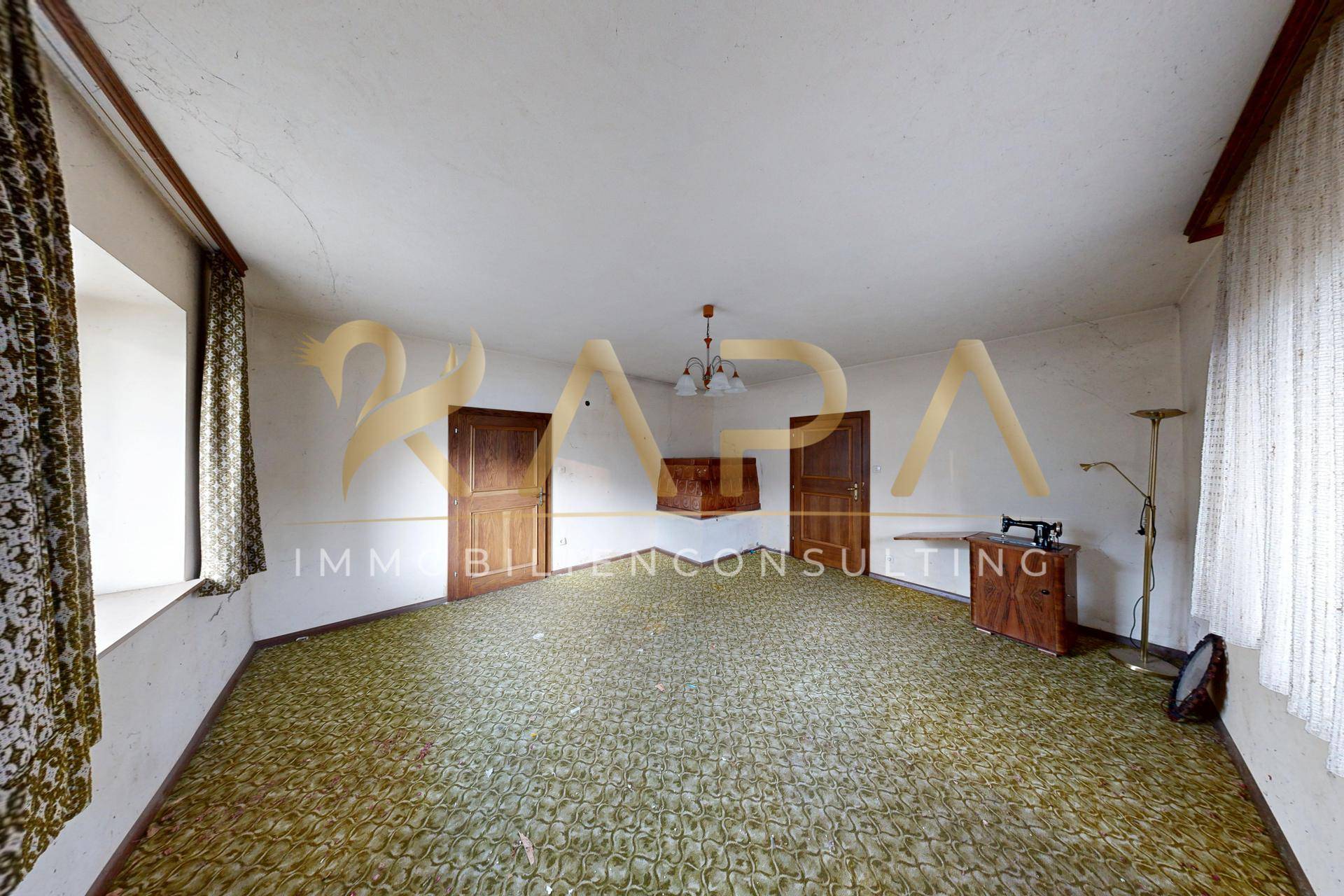 EG Wohnzimmer mit Kachelofen