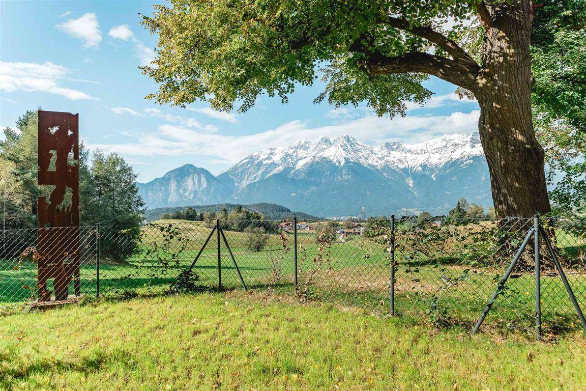 Die_Maklerei_Igls_Gartenfläche_Aussicht