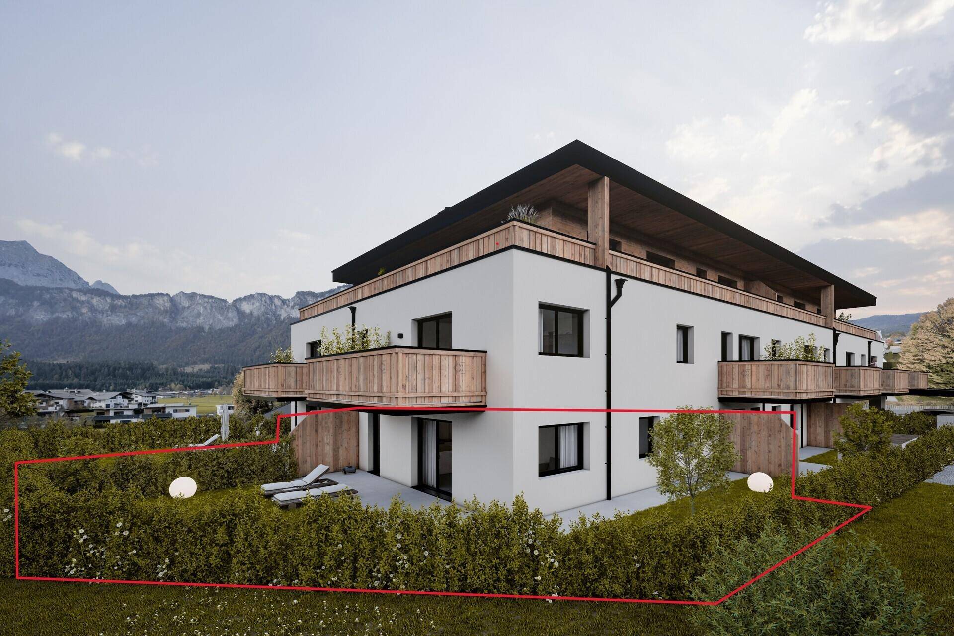 Visualisierung eines modernen Wohngebäudes mit Holzdetails und umrandetem Gartenbereich vor Bergpanorama.