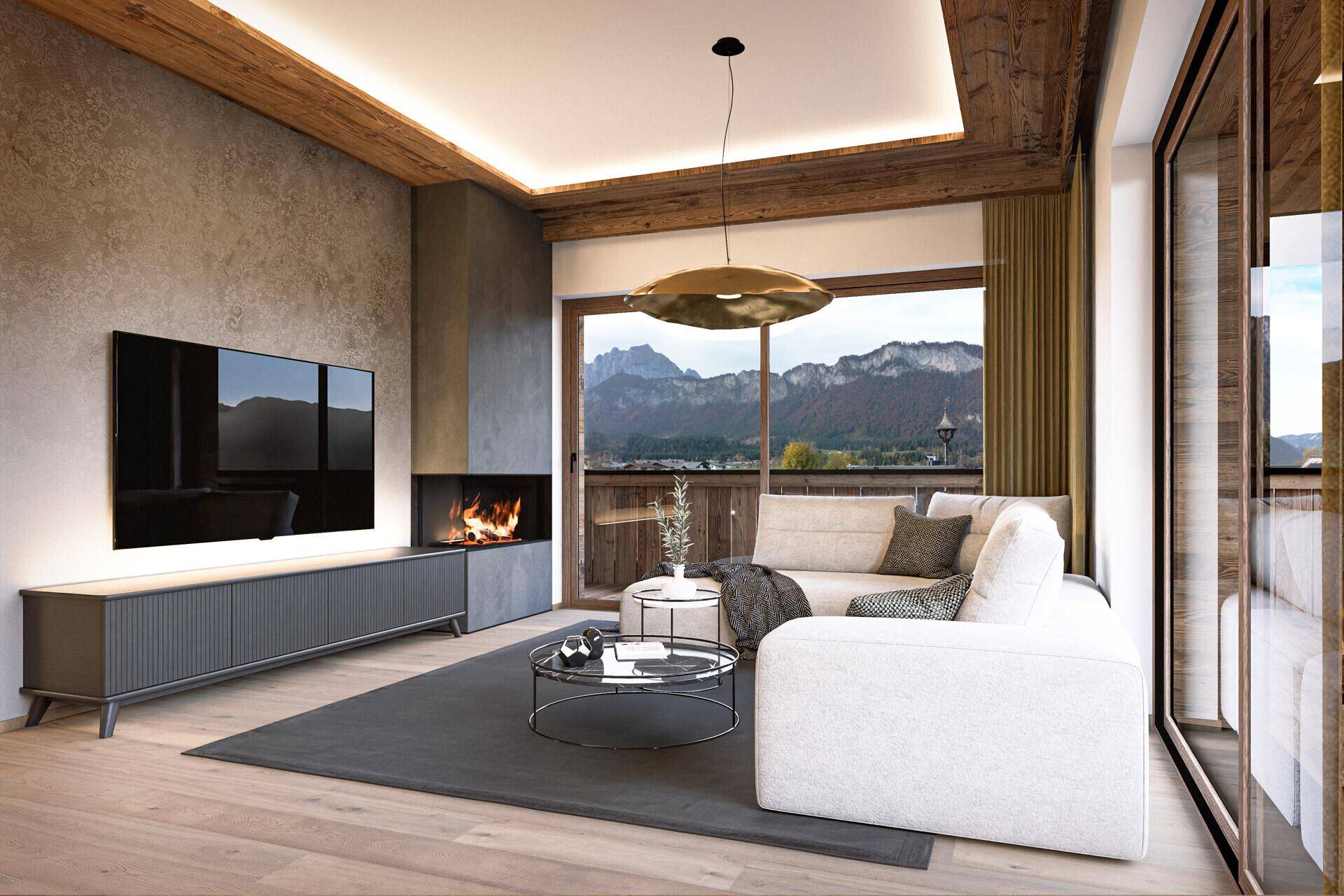 Gemütliches Wohnzimmer mit Kamin, Holzbalkendecke und Zugang zum Balkon mit atemberaubendem Bergblick.