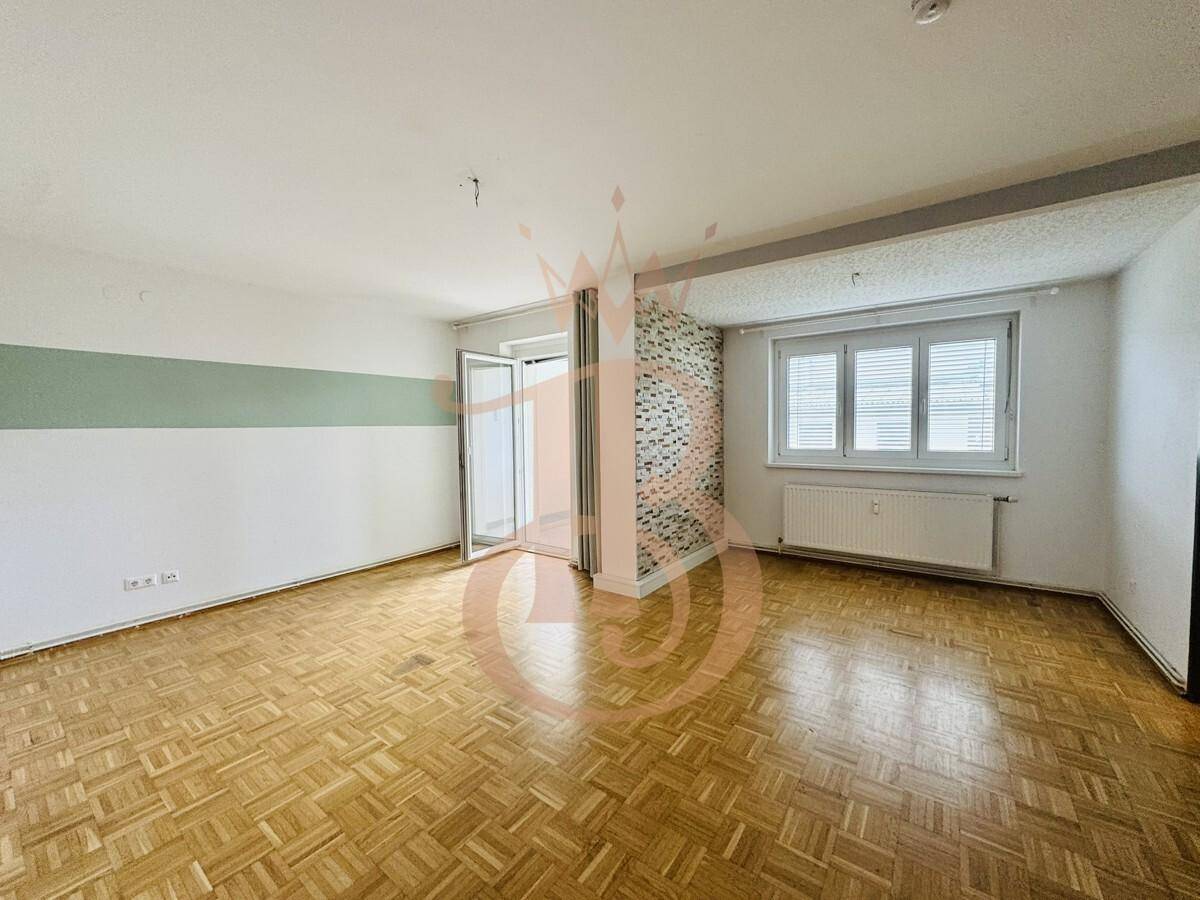 Wohnzimmer mit Süd- Loggia