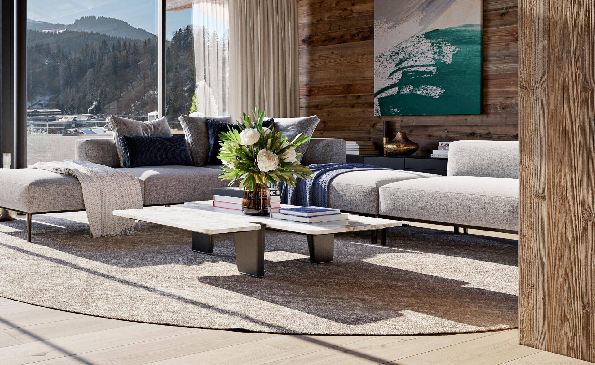 Geräumiges Wohnzimmer mit großem Sofa, modernem Couchtisch und bodentiefen Fenstern mit Bergblick.