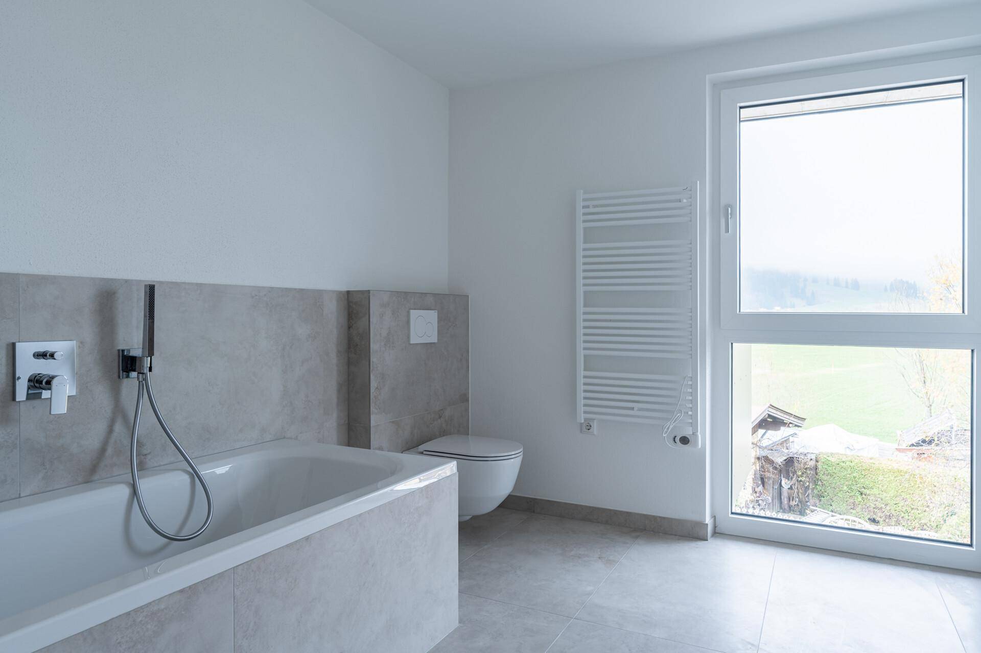 Erstklassige DG-Wohnung mit Horn- und Kaiserblick - Mehr