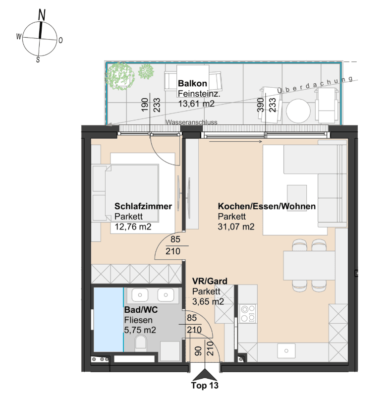 Grundriss der Wohnung Top 13 mit Schlafzimmer, Wohn-Essbereich und Balkon.