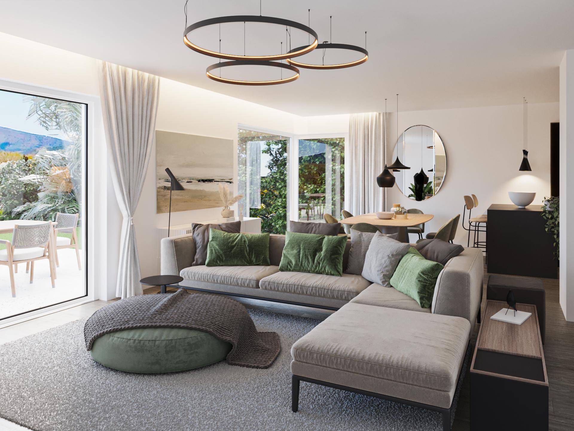 Heller, offener Wohn-Essbereich mit modernem Sofa, Esstisch und Zugang zur Terrasse.