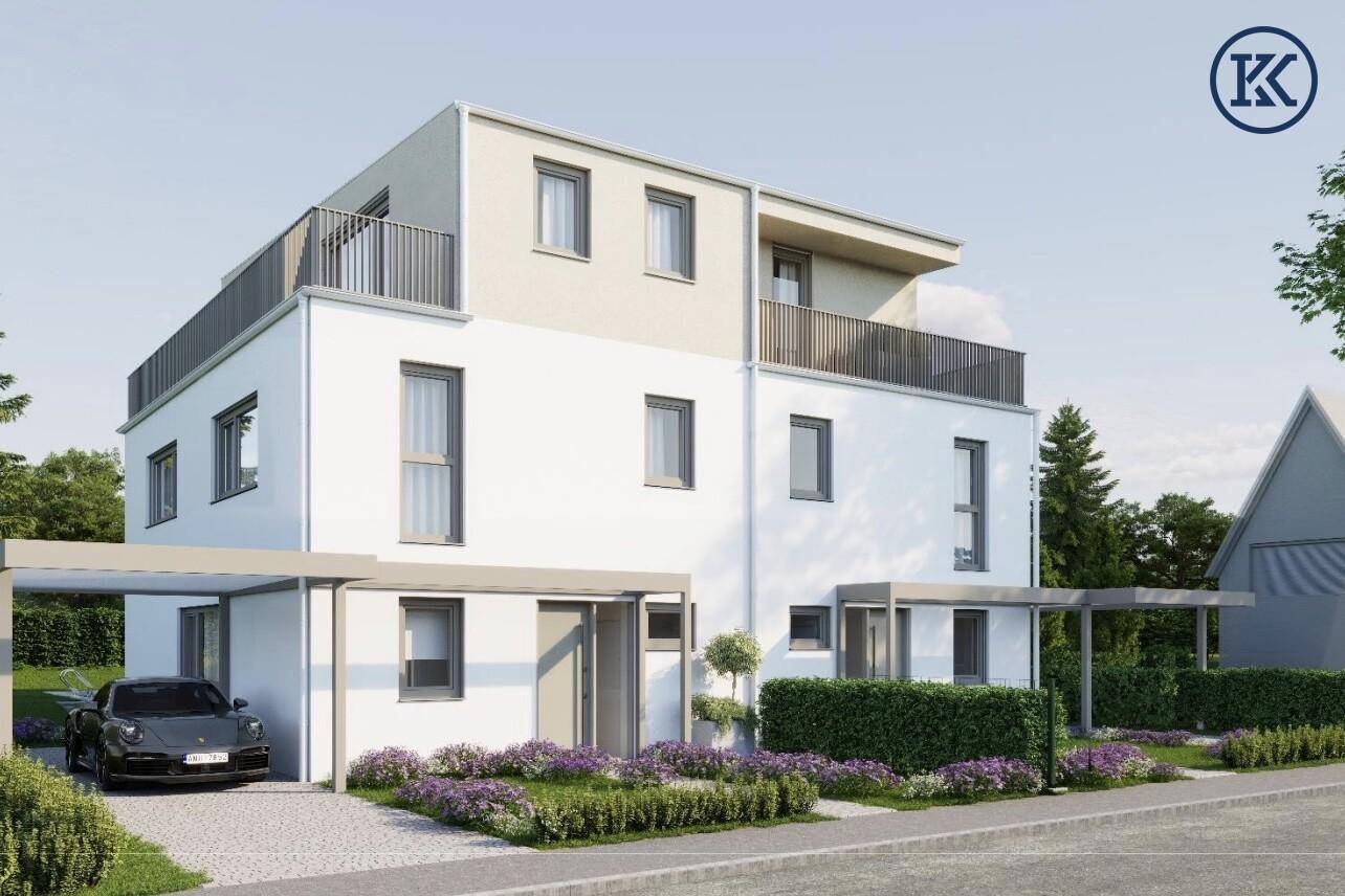 Moderne Architektur des Neubaus mit Carport und gepflegter Vorgartenbepflanzung.