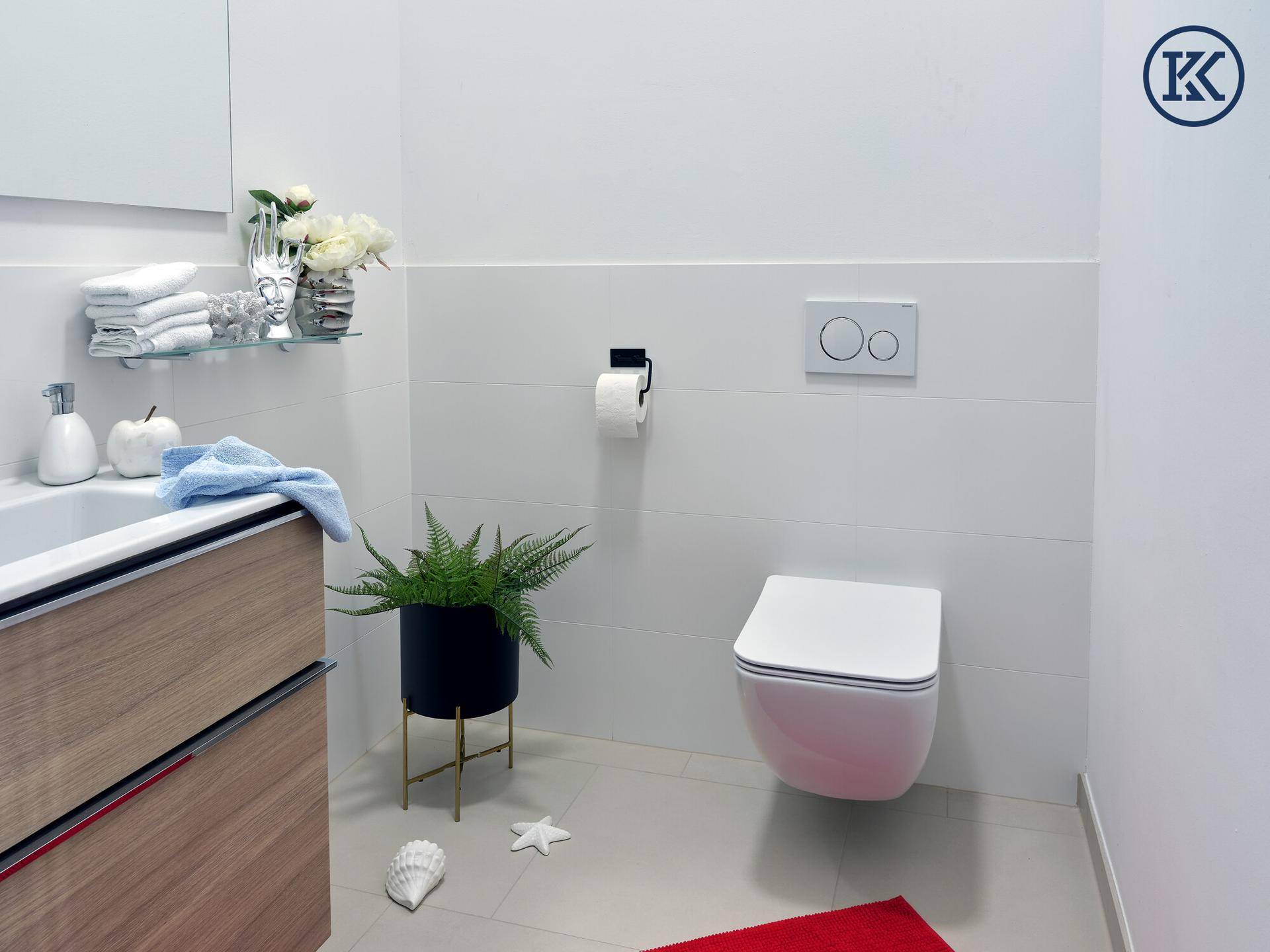 Modernes Gäste-WC mit wandhängender Toilette, Holzwaschtisch und weißen Fliesen.