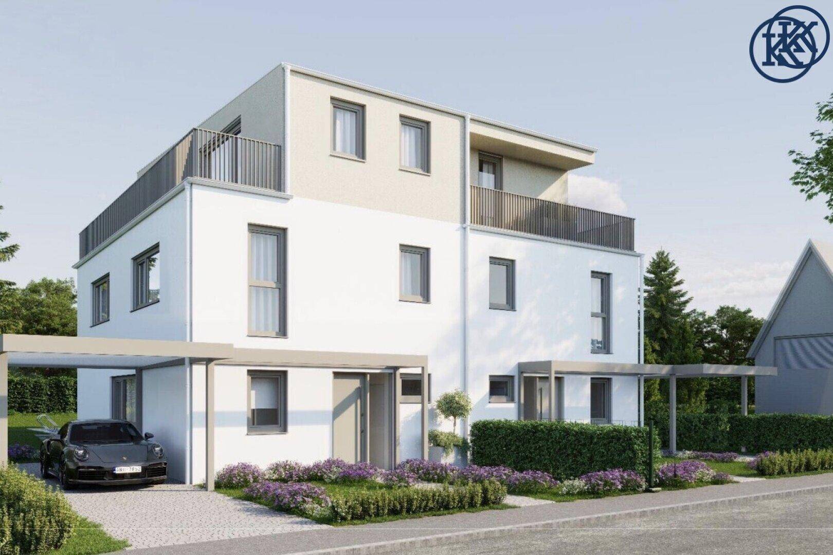 Ansicht der modernen Hausfassade mit Carport, Balkonen und gepflegter Vorgartenbepflanzung.