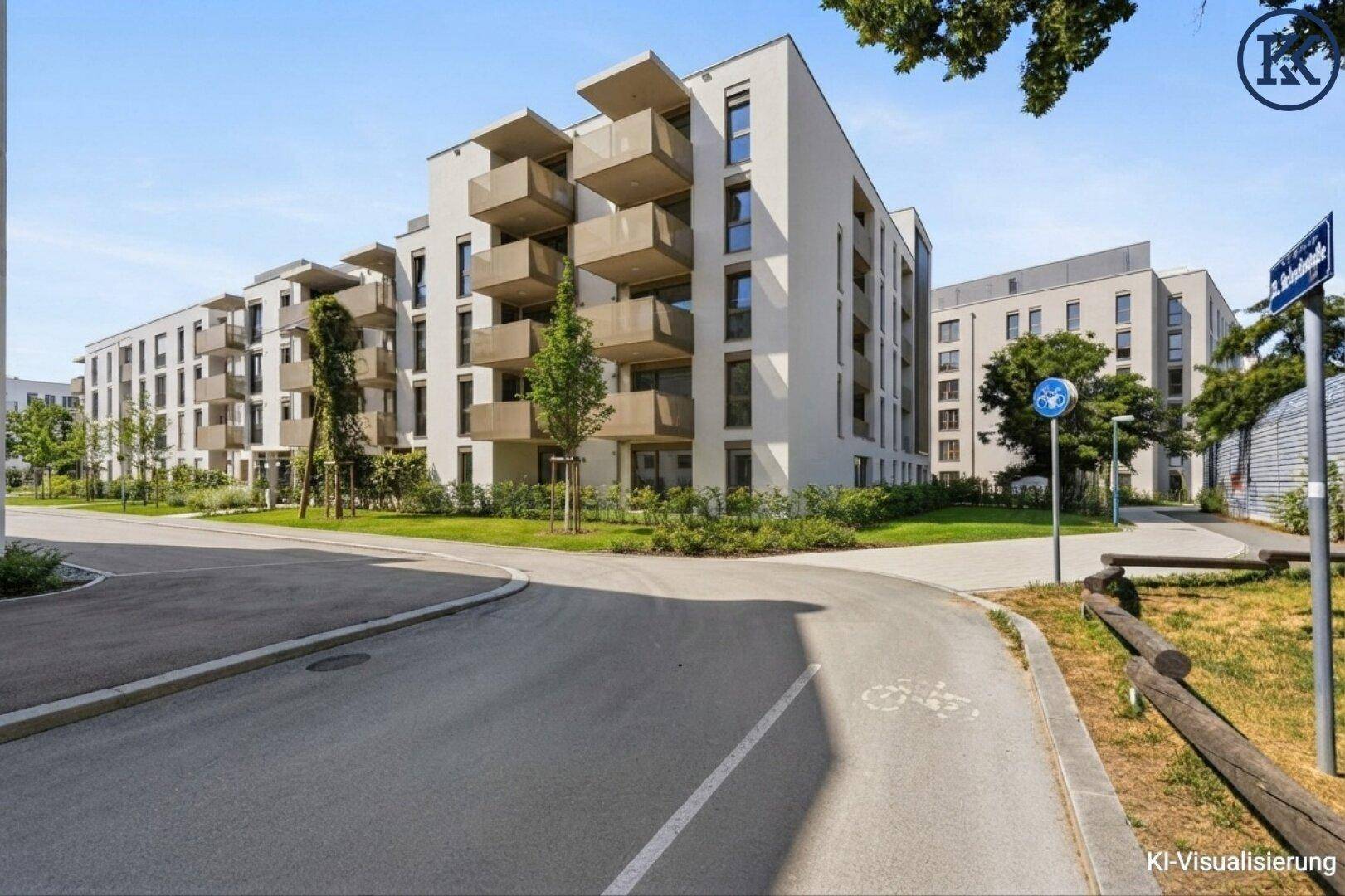 Neubau-Wohngebäude in einer ruhigen Wohngegend mit Bäumen und Gehwegen.