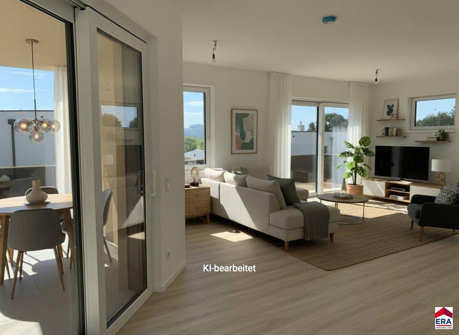 Gemütlicher Wohn- und Essbereich mit moderner Einrichtung, Laminatboden und hellem Ambiente.