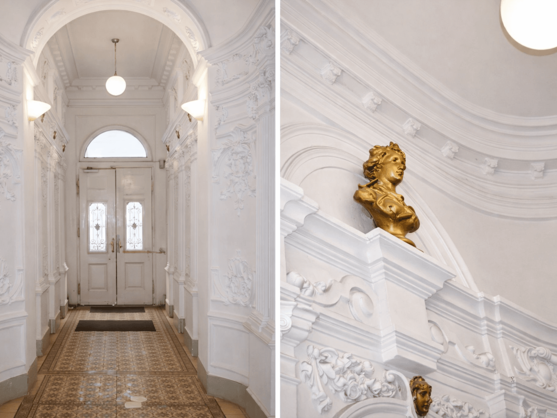 Eingangsbereich mit kunstvollen Stuckverzierungen, hohen Decken und goldener Büste.