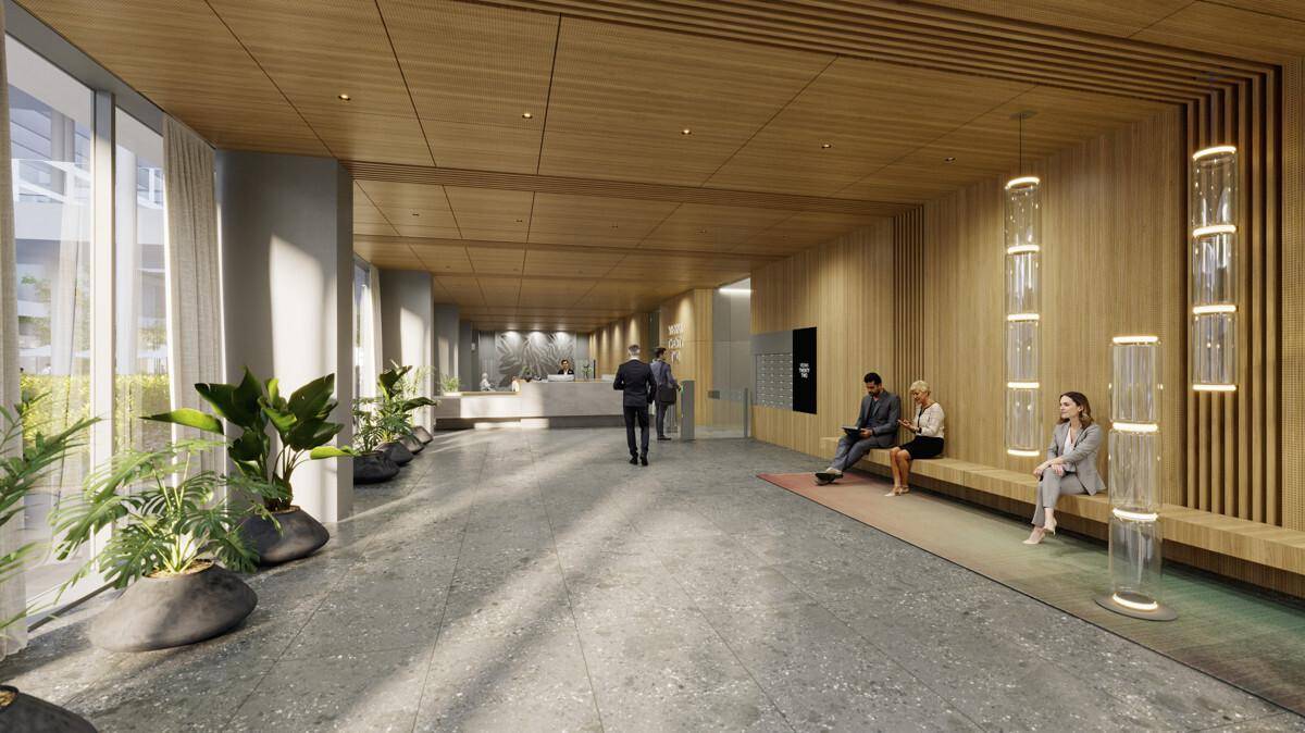 Moderne und einladende Lobby mit Holzverkleidung, Steinboden und Pflanzen, ideal für Empfangsbereiche.