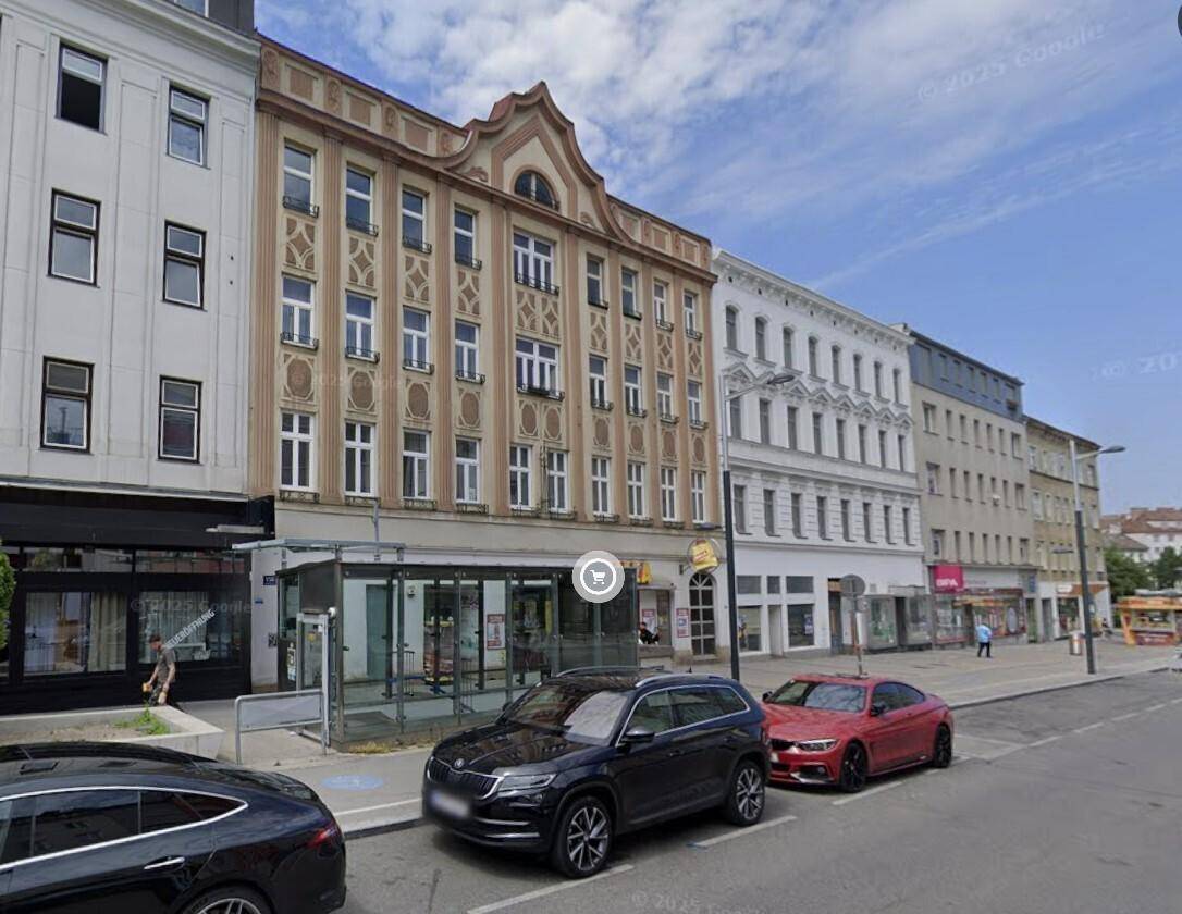 Einfahrt zu einer Tiefgarage mit Beschilderung für P+R Neumarkt und der Waldgasse.