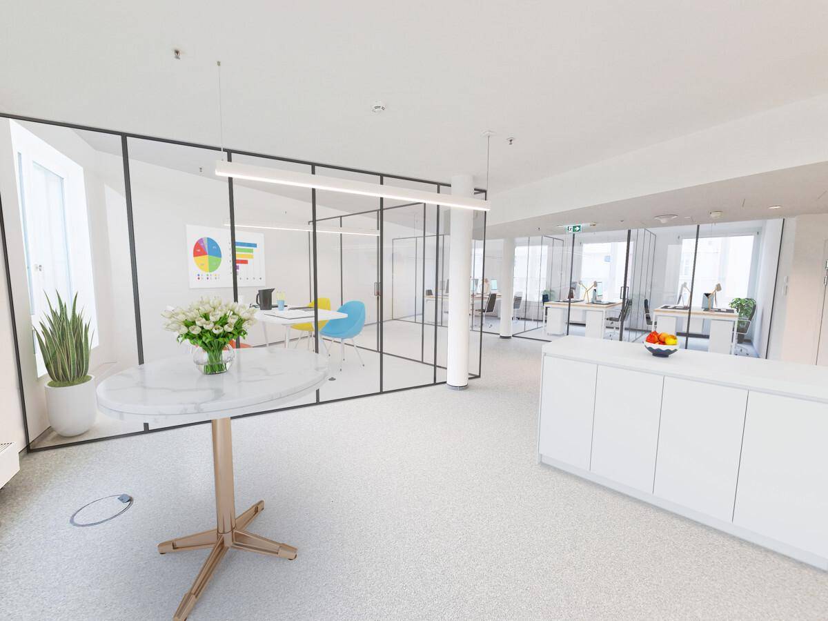 Heller Bürobereich mit einem runden Tisch, Glaswänden und Blick auf weitere Arbeitsplätze.