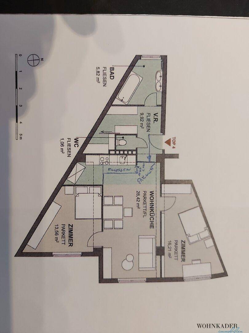 Grundriss der Wohnung mit drei Zimmern, offener Wohnküche und separatem WC.