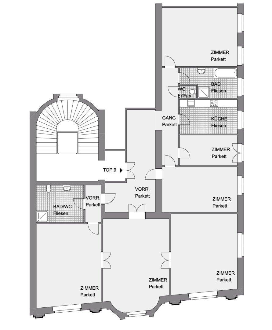 Grundriss einer Wohnung mit mehreren Zimmern, Küche, Bad und separatem WC.
