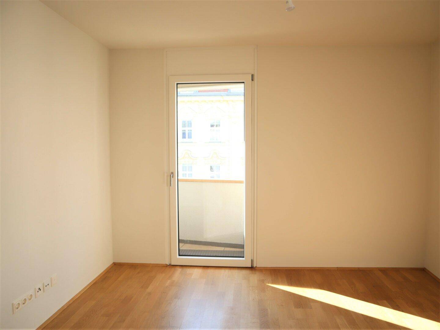 Schlafzimmer mit Balkonzugang