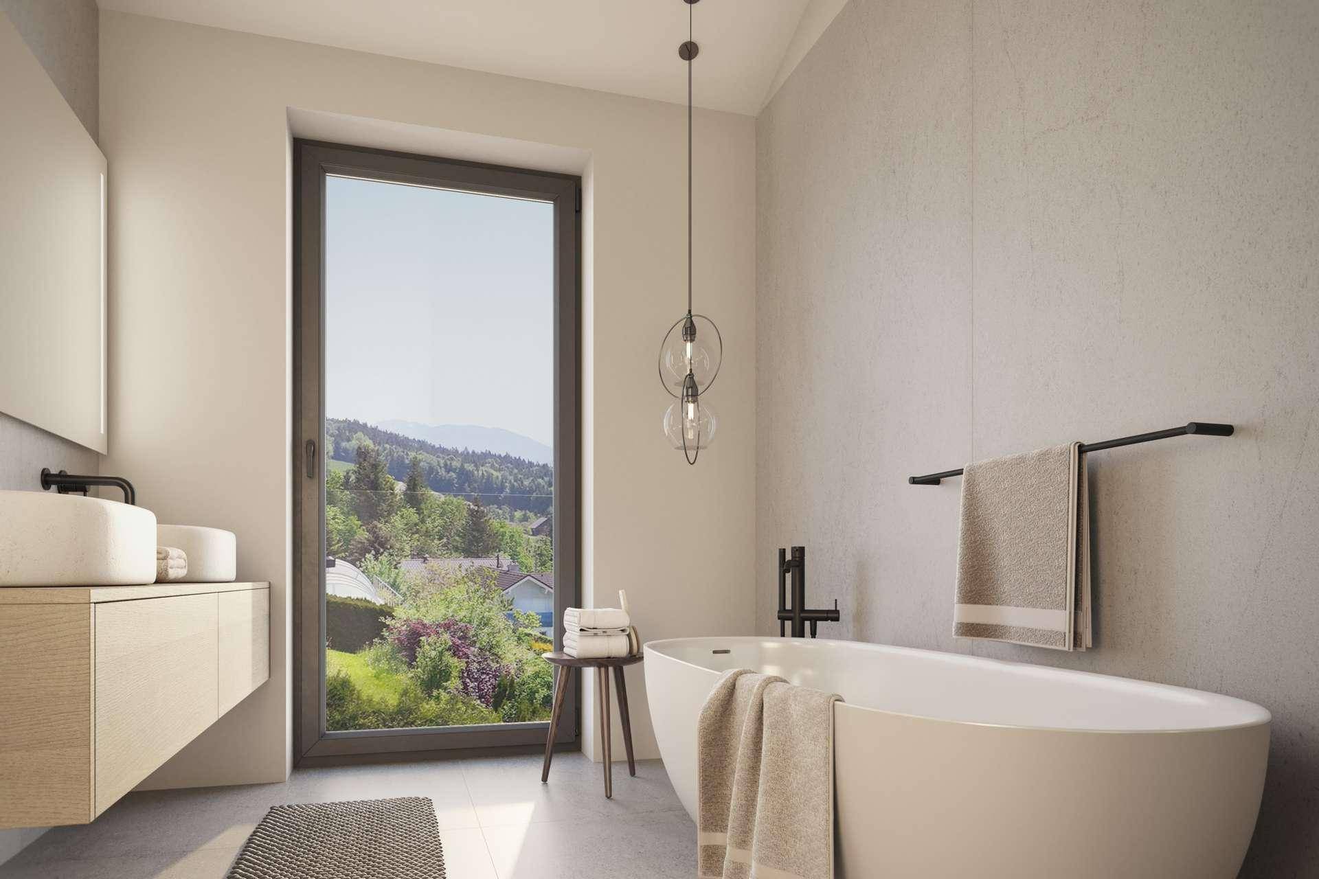 Helles Badezimmer mit freistehender Badewanne, Einzelwaschbecken und großem Fenster mit Aussicht.
