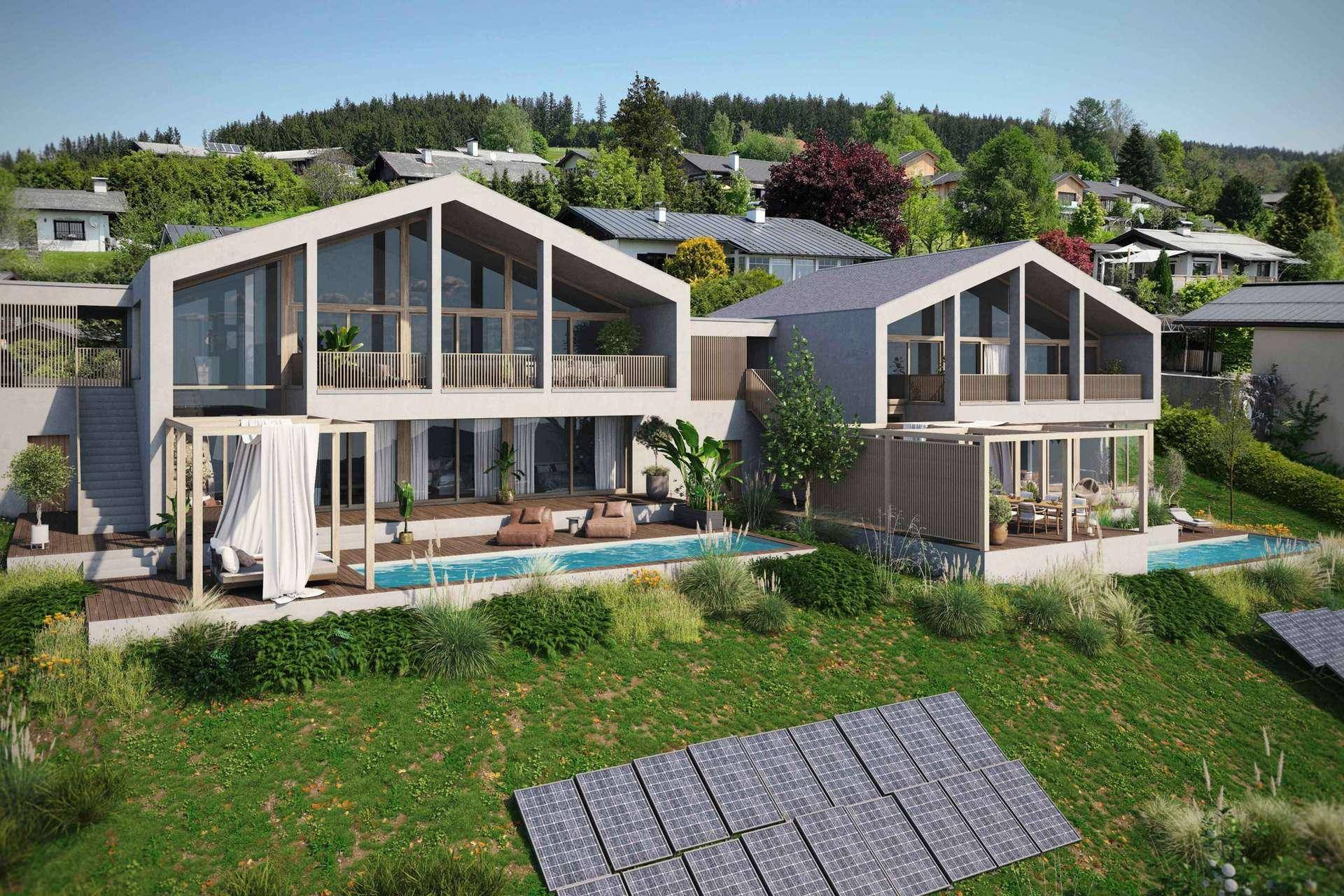 Detailansicht der modernen Villen mit Pools, Terrassen und Solaranlagen in sonniger Hanglage.